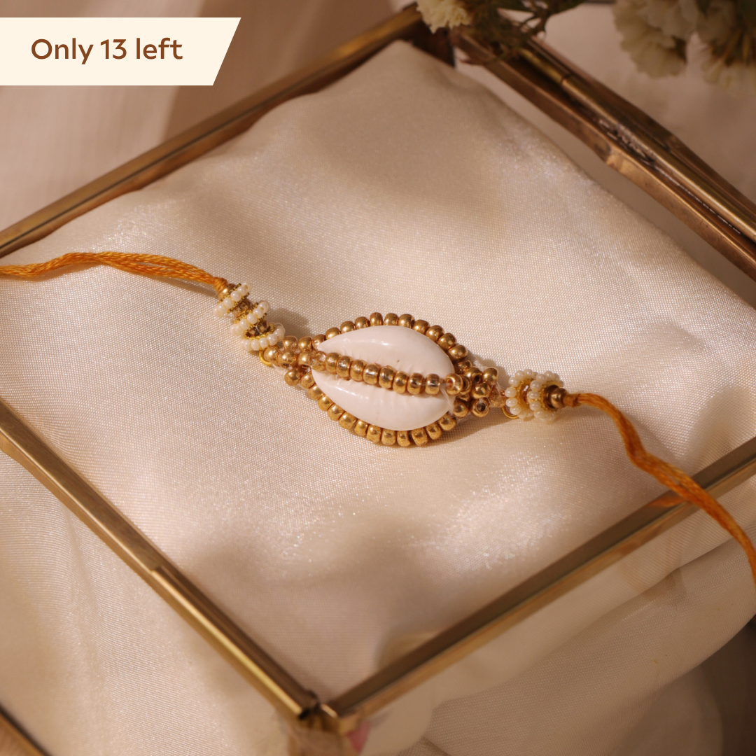 Golden Cowry Shell Beadwork Rakhi