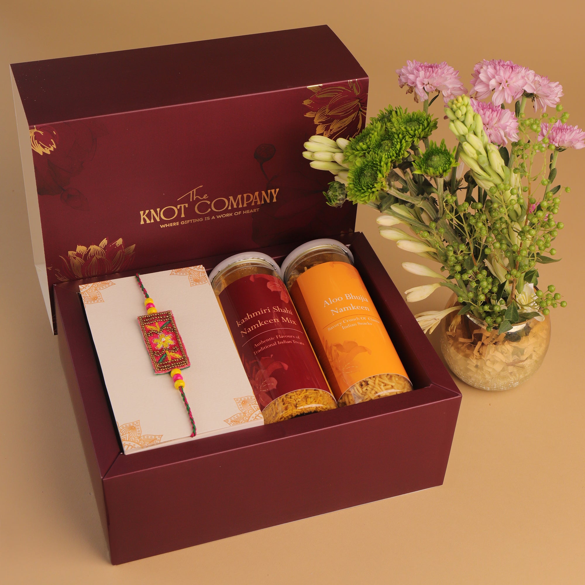 Floral Embroidery Rakhi Crunch Munch Hamper